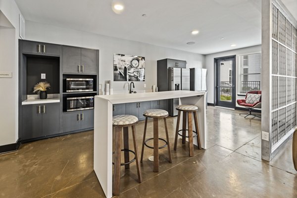 Modern clubhouse with upscale furnishings at Apex Marathon Village Apartments