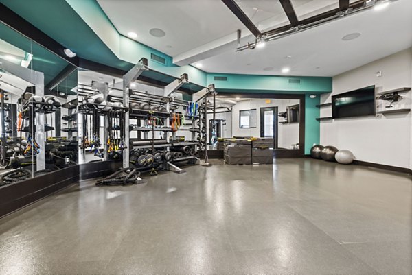 fitness center at Apex Marathon Village Apartments