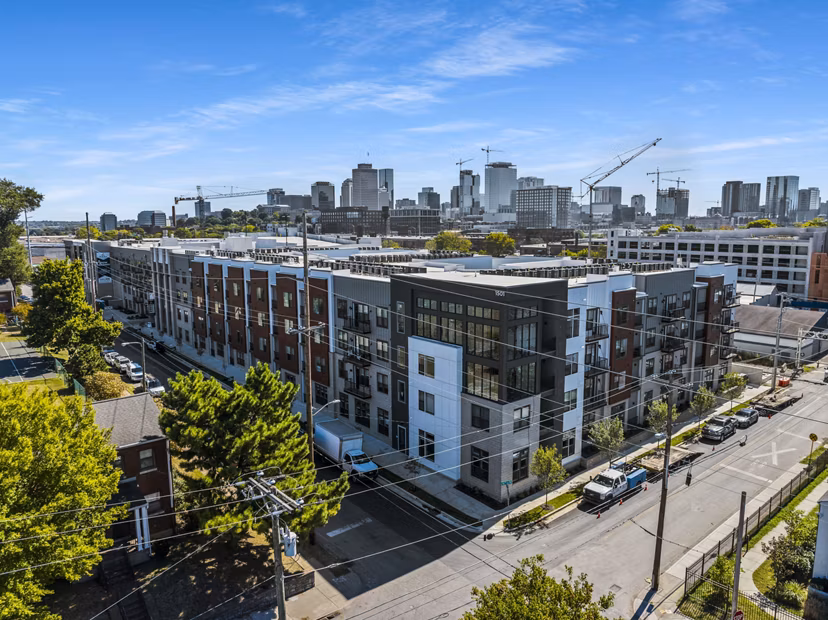 Apex Marathon Village Apartments: Elegant view of luxury apartments in vibrant Greystar community