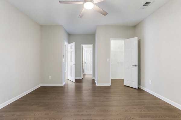 Modern bedroom with elegant decor at Ashton Brook Apartments in Nashville, luxury living at its finest