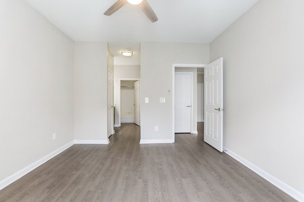 Modern bedroom with sleek design at Ashton Brook Apartments, luxury residences by Greystar in a serene setting