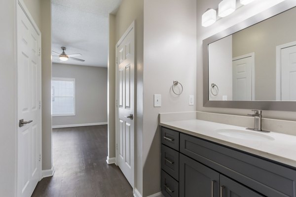Modern bathroom with sleek design at Ashton Brook Apartments featuring luxury fixtures
