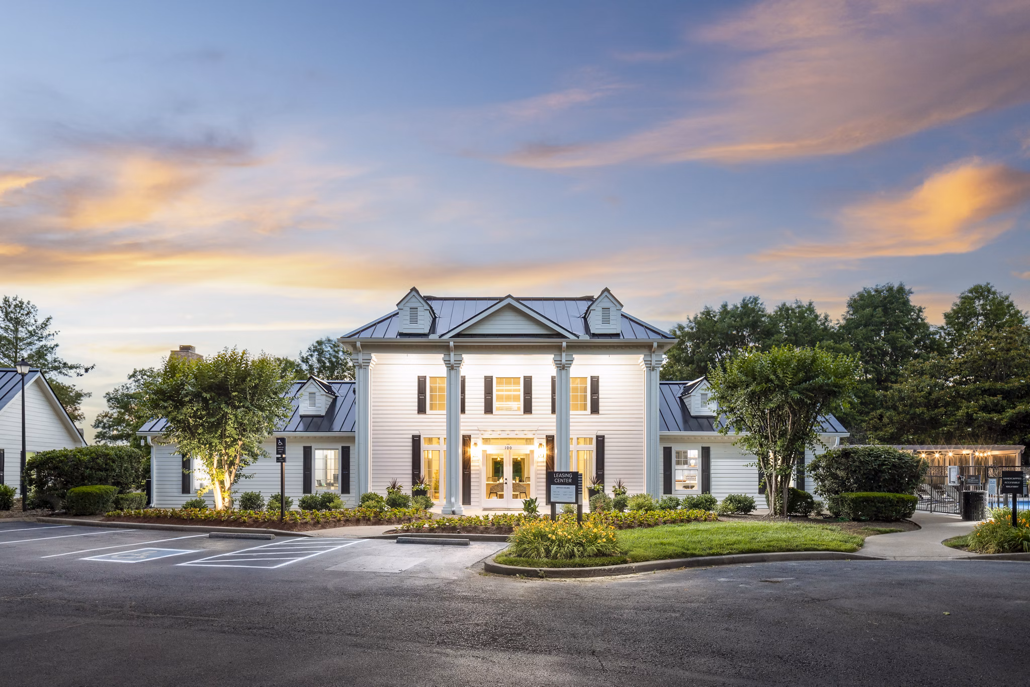 Modern clubhouse with cozy seating and pool table at Ashton Brook Apartments