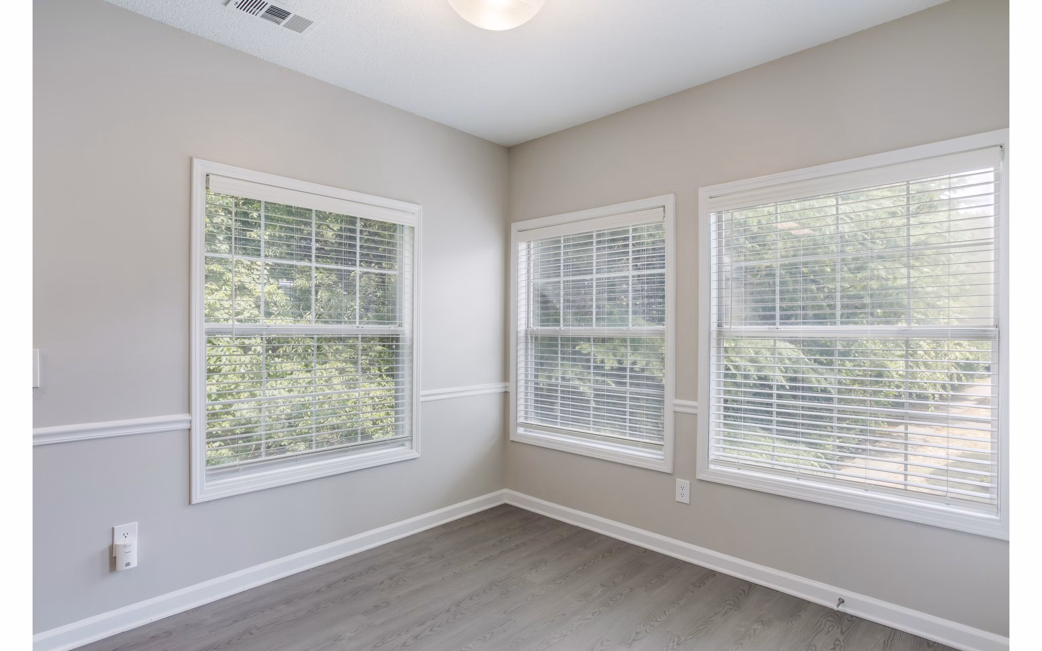 Dining room with elegant decor and modern furnishings at Ashton Brook Apartments luxury community