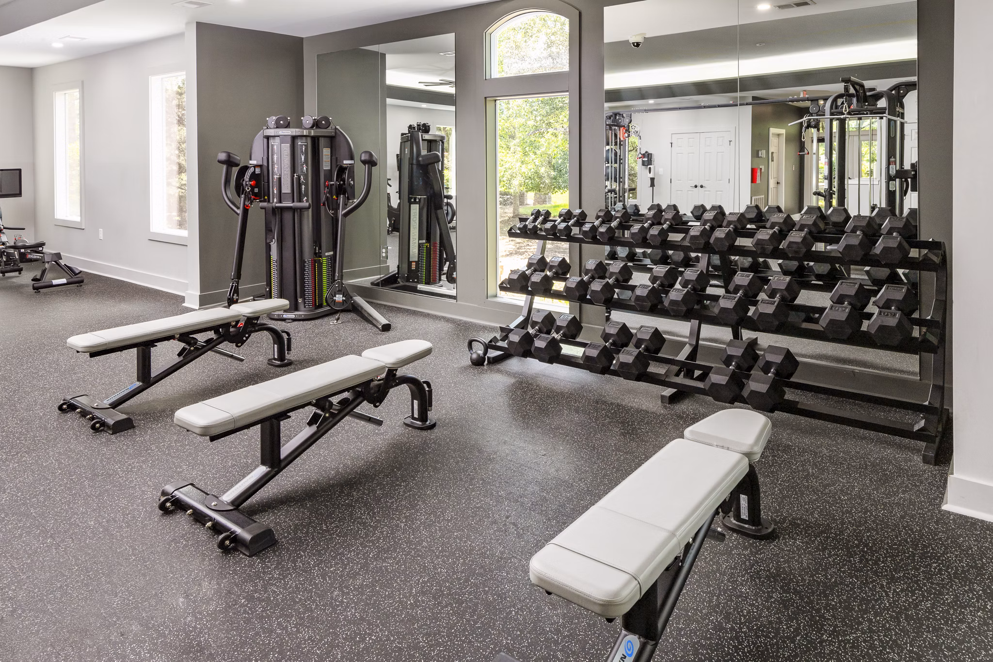 Modern fitness center with state-of-the-art equipment at Ashton Brook Apartments, enhancing your luxury living experience