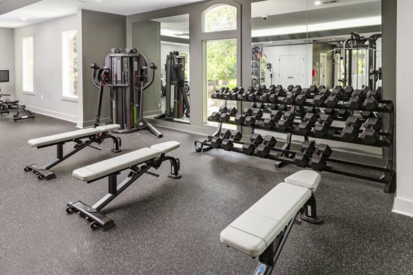 Modern fitness center with state-of-the-art equipment at Ashton Brook Apartments, enhancing your luxury living experience