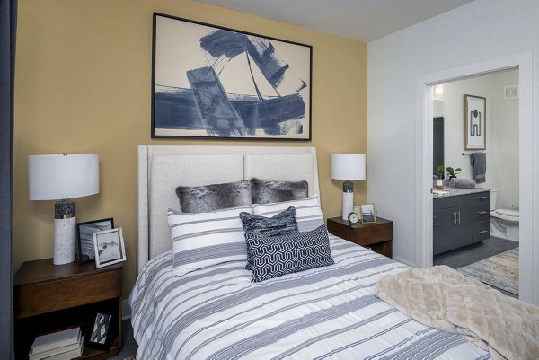 Cozy bedroom with modern decor at Prose Cartersville Apartments, a Greystar community
