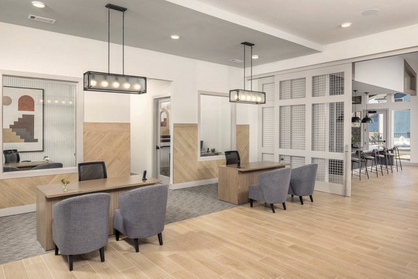 Clubhouse featuring modern design and comfortable seating at Prose Cartersville Apartments