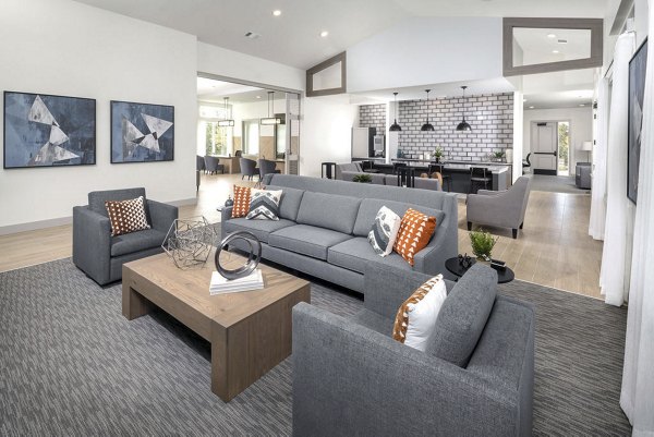 Clubhouse featuring modern decor and ample seating at Prose Cartersville Apartments, ideal for social gatherings and community events