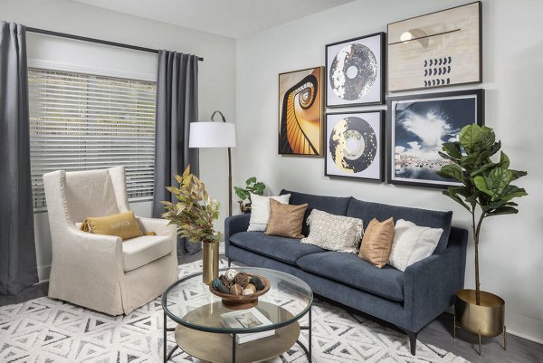 Spacious living room with natural light and modern furnishings at Prose Cartersville Apartments