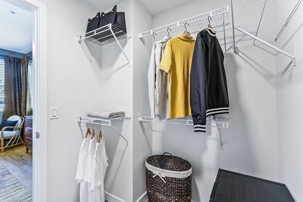 Bedroom closet with organized shelving at Jefferson La Mesa Apartments for spacious luxury storage solutions