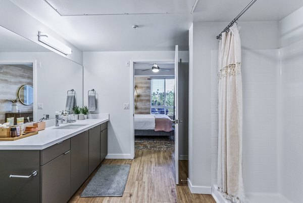 Contemporary bathroom with sleek fixtures and modern design at Jefferson La Mesa Apartments