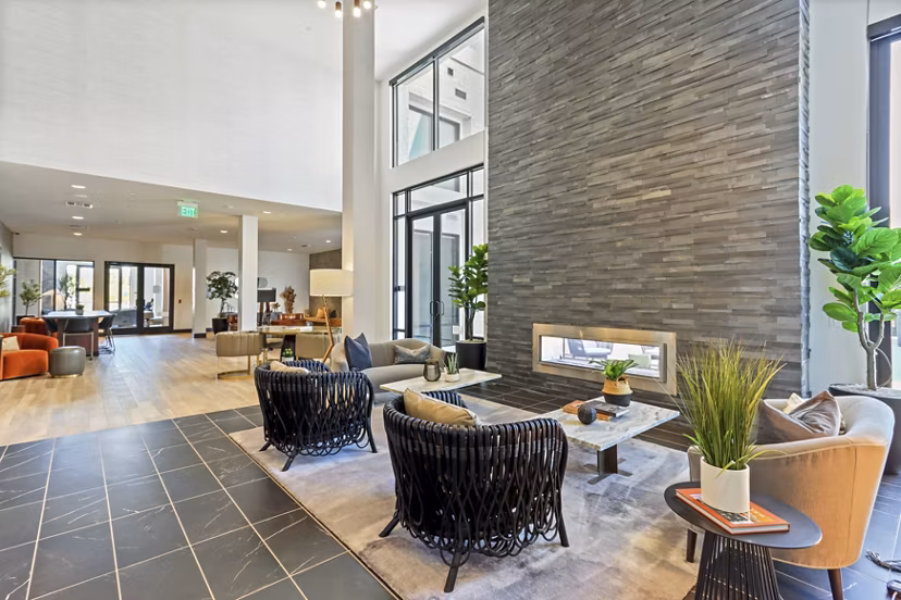 Elegant clubhouse with modern furnishings at Jefferson La Mesa Apartments, perfect for social gatherings and relaxation