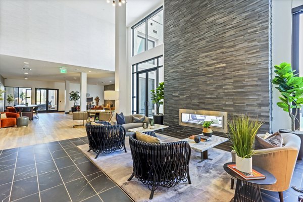 Elegant clubhouse with modern furnishings at Jefferson La Mesa Apartments, perfect for social gatherings and relaxation