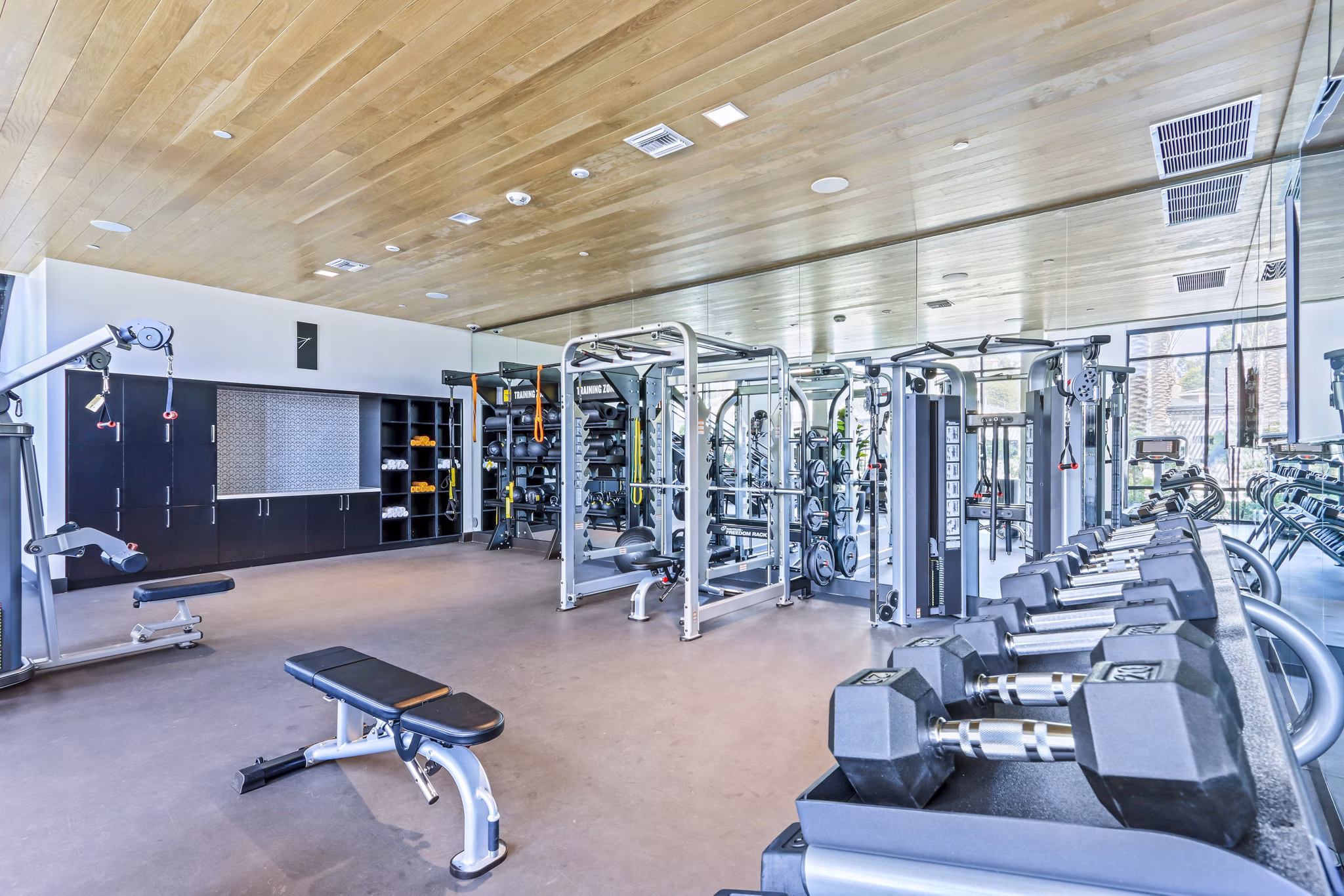 Fully-equipped fitness center with modern machines at Jefferson La Mesa Apartments