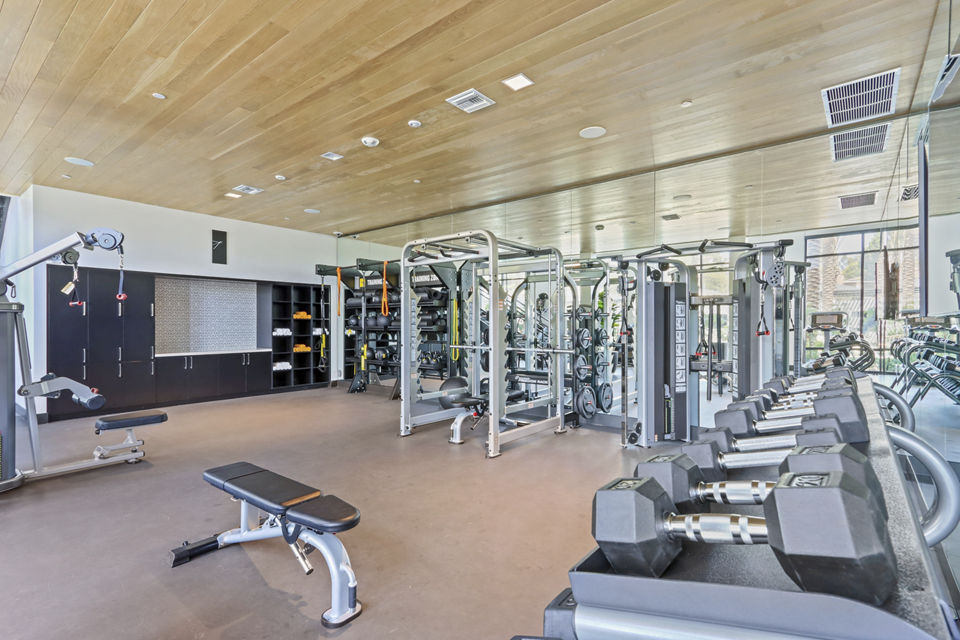 Fully-equipped fitness center with modern machines at Jefferson La Mesa Apartments