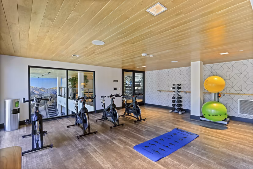 Well-equipped fitness center at Jefferson La Mesa Apartments with modern exercise equipment
