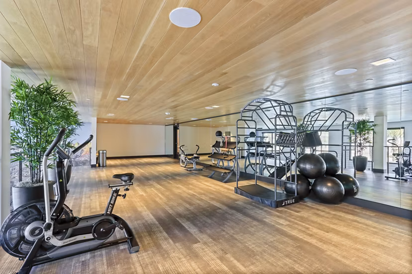 Modern yoga/spin studio with state-of-the-art equipment at Jefferson La Mesa Apartments, ideal for fitness enthusiasts