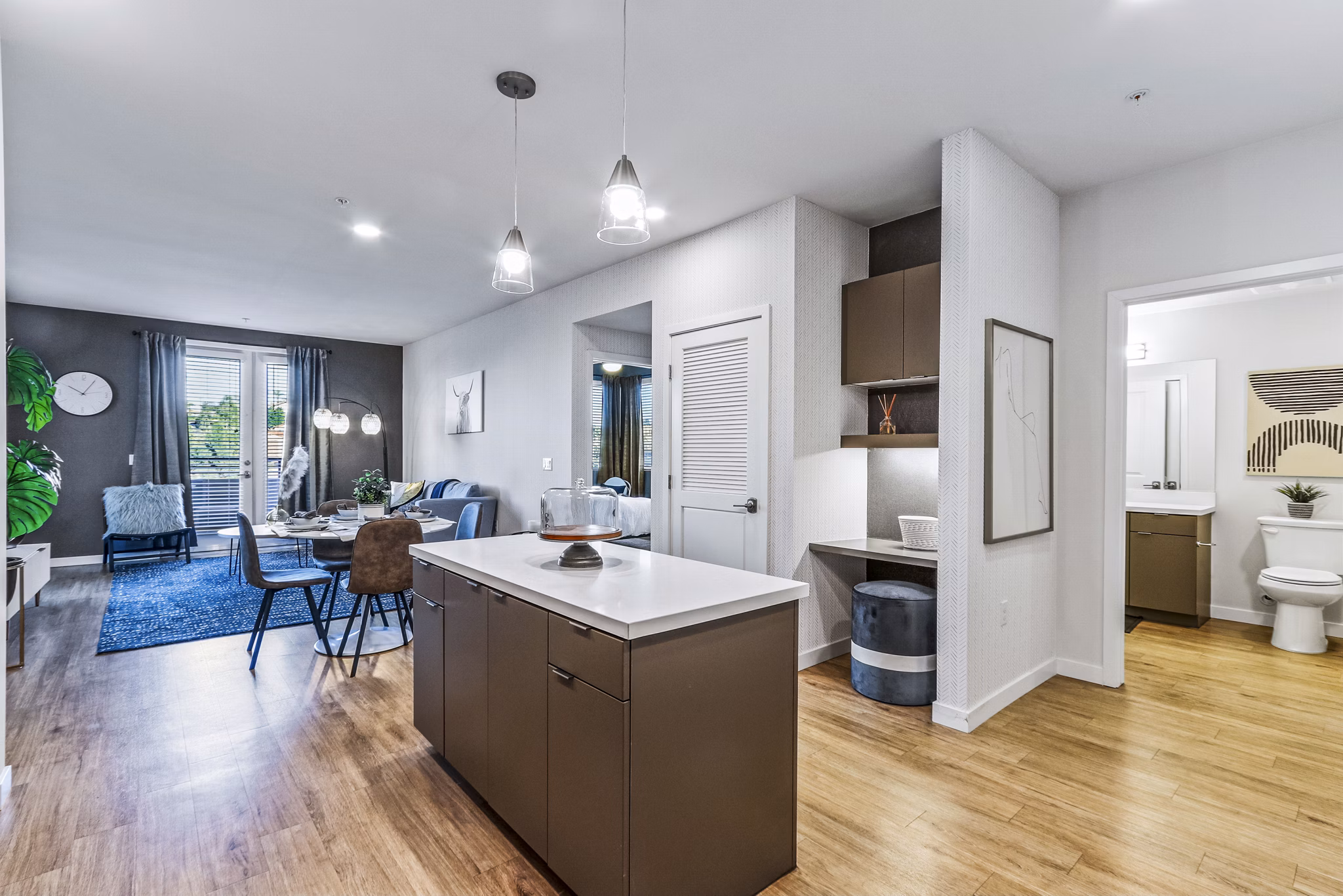 Luxurious kitchen with sleek granite countertops and stainless steel appliances at Jefferson La Mesa Apartments