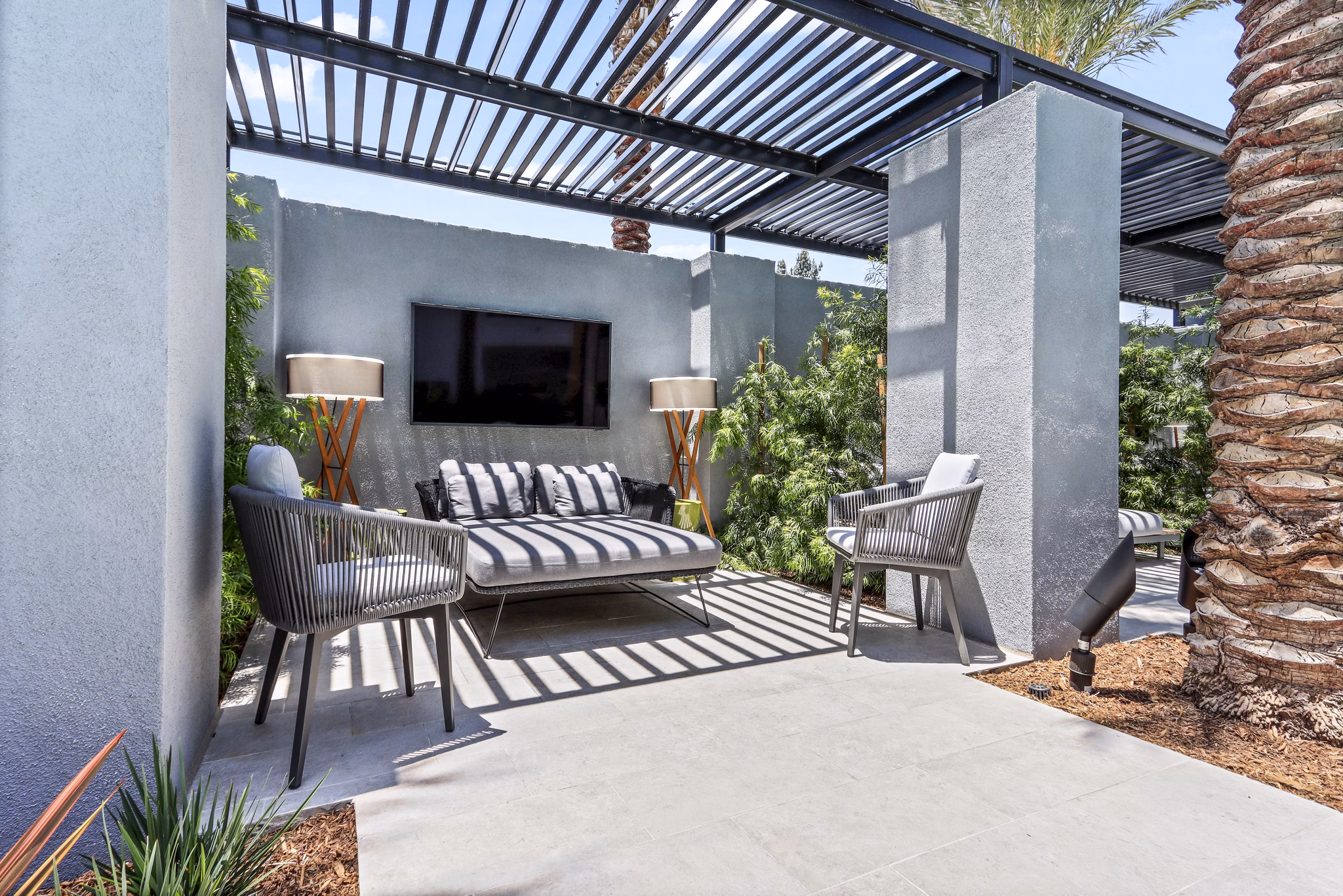 Chic outdoor patio with cozy seating at Jefferson La Mesa Apartments, perfect for relaxation and social gatherings