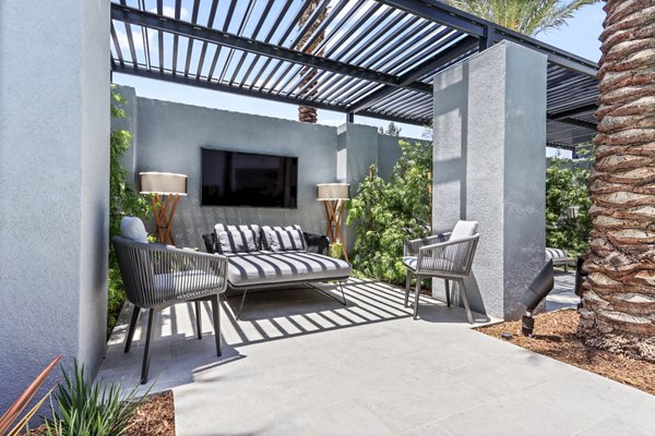 Chic outdoor patio with cozy seating at Jefferson La Mesa Apartments, perfect for relaxation and social gatherings