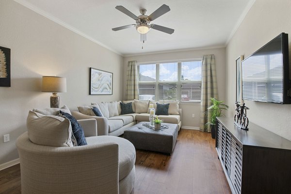living room at Integra Lakes Apartments: Luxury with modern design in a serene setting