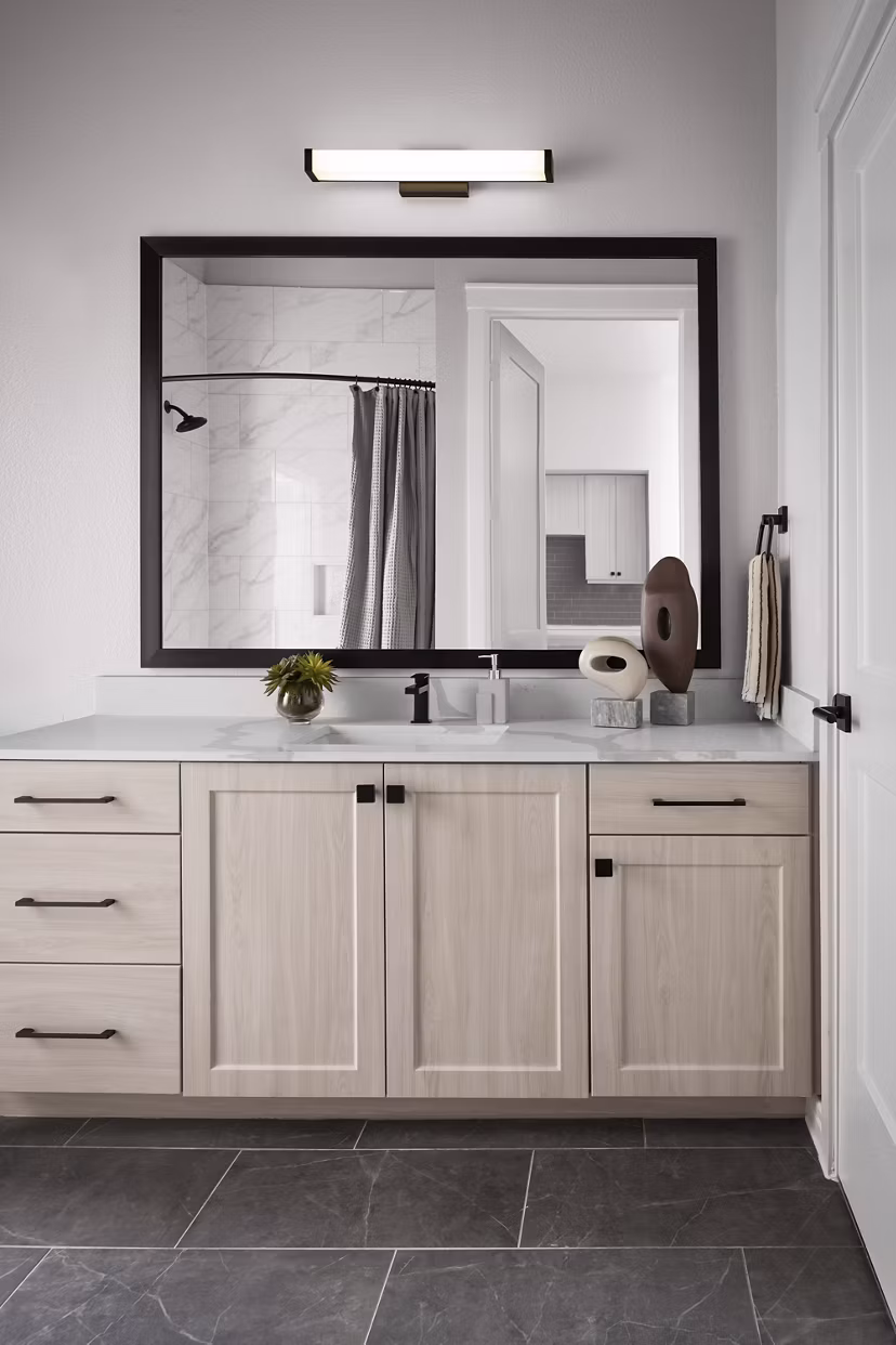 Modern bathroom with marble countertops at The Ludlow Apartments featuring luxury finishes in NYC