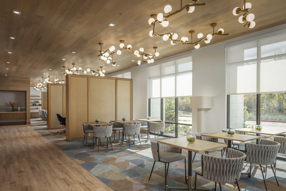 Clubhouse at The Ludlow Apartments featuring modern design elements and comfortable seating areas for residents to relax and socialize