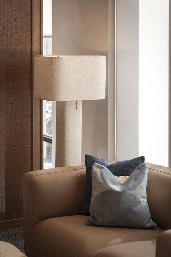 Luxurious clubhouse featuring modern decor and seating at The Ludlow Apartments