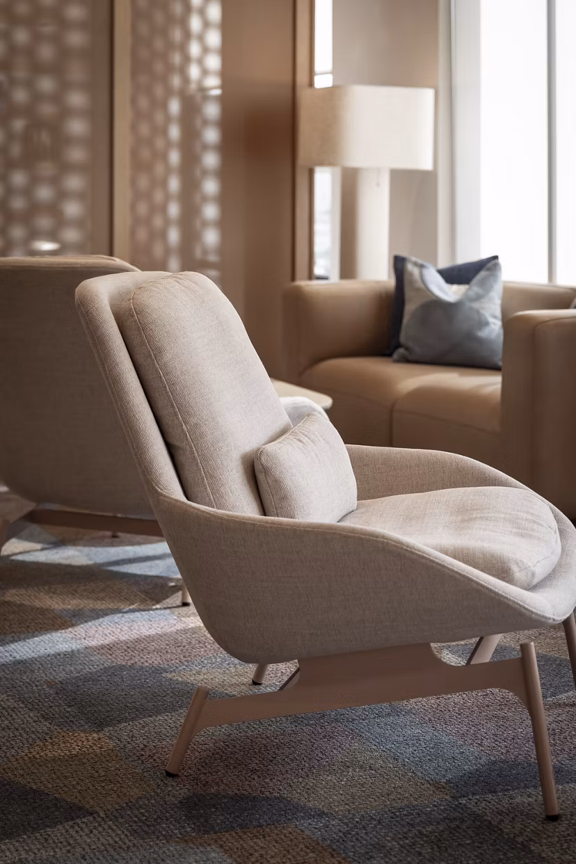 Spacious and modern clubhouse at The Ludlow Apartments with elegant seating areas for residents to relax and socialize