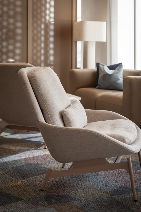 Spacious and modern clubhouse at The Ludlow Apartments with elegant seating areas for residents to relax and socialize