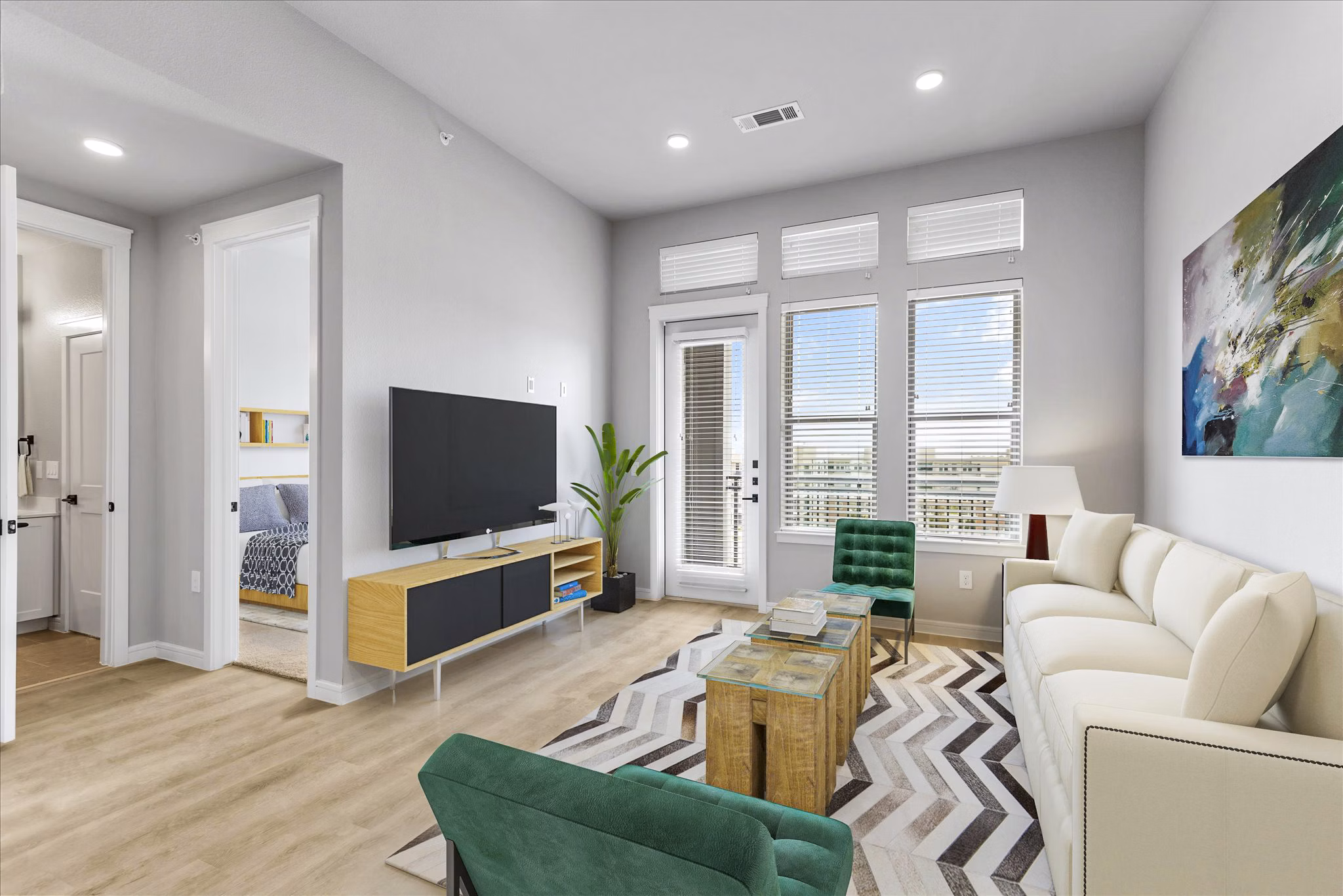 Contemporary living room with modern decor at The Ludlow Apartments in New York City