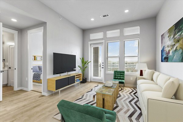 Contemporary living room with modern decor at The Ludlow Apartments in New York City