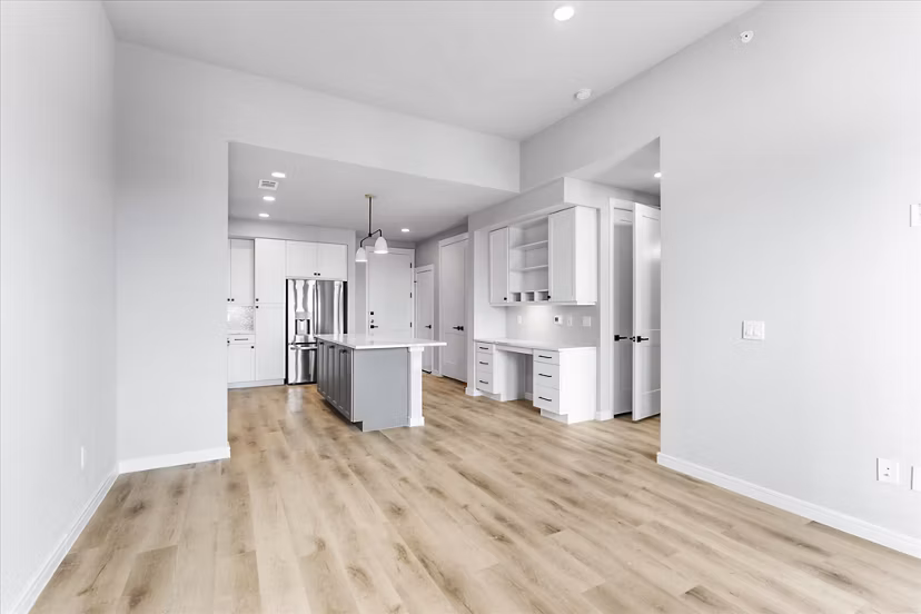 Modern living room with sleek furnishings and vibrant decor in The Ludlow Apartments, luxury apartments in lively city setting