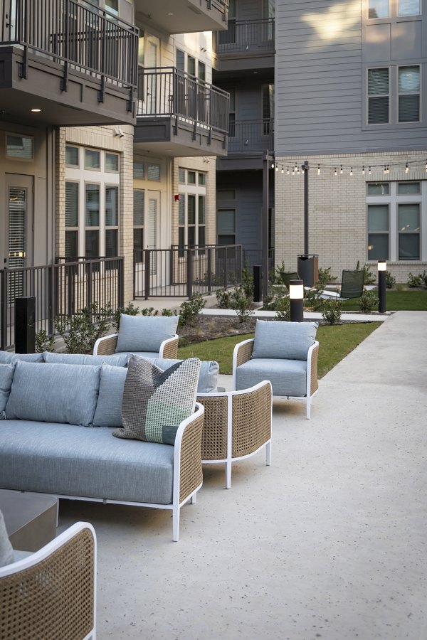 Courtyard with landscaped gardens at The Ludlow Apartments, a luxury property offering premium amenities and modern living spaces