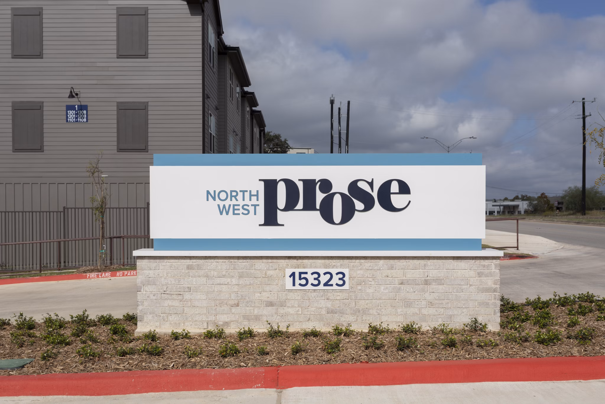 Prose North West Apartments signage: Stylish modern design marking luxury apartment entrance