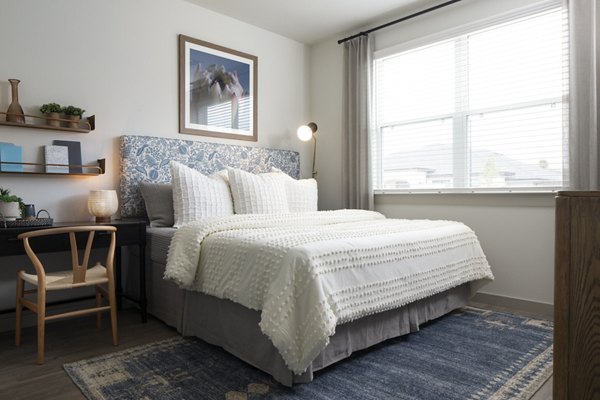 Bedroom with modern decor and natural light in Prose North West Apartments