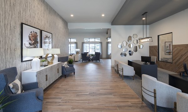 Modern clubhouse with cozy seating at Prose North West Apartments