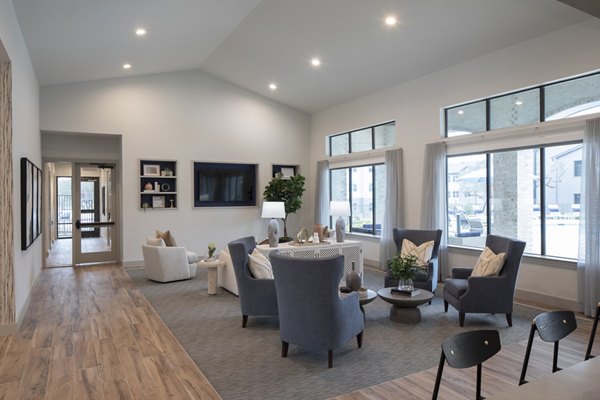 Modern clubhouse with stylish seating and indoor plants at Prose North West Apartments, ideal for social gatherings