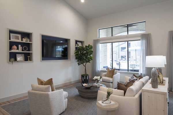 Clubhouse with modern furnishings and vibrant decor at Prose North West Apartments