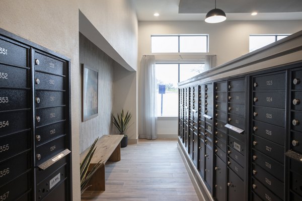 Mail room equipped with secure package lockers at Prose North West Apartments for convenient parcel retrieval