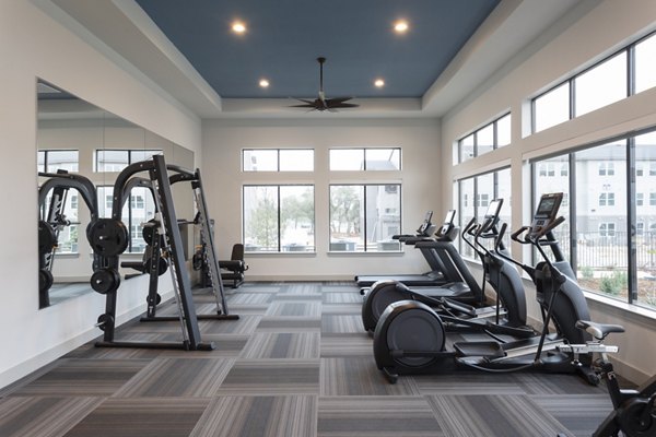 State-of-the-art fitness center featuring modern equipment at Prose North West Apartments