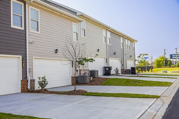 Tranquil Gardens Homes: Contemporary garage entrance in luxury apartment community