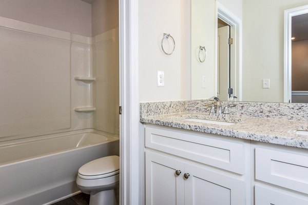 Modern bathroom with luxurious fixtures at Tranquil Gardens Homes