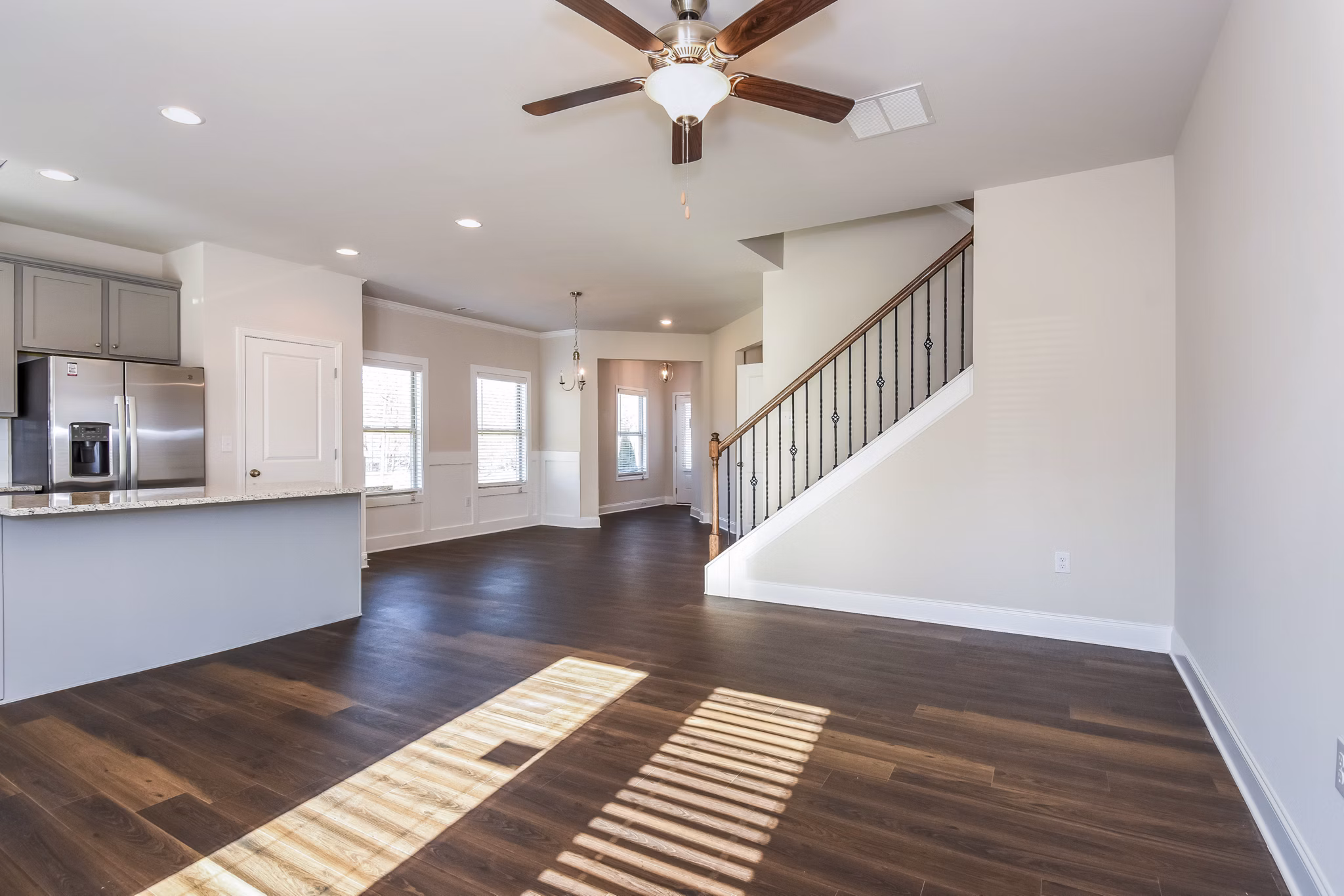 Spacious living room with elegant decor at Tranquil Gardens Homes