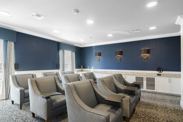 Luxury theater room with plush seating at Outlook Gwinnett Apartments, perfect for entertainment and relaxation sessions