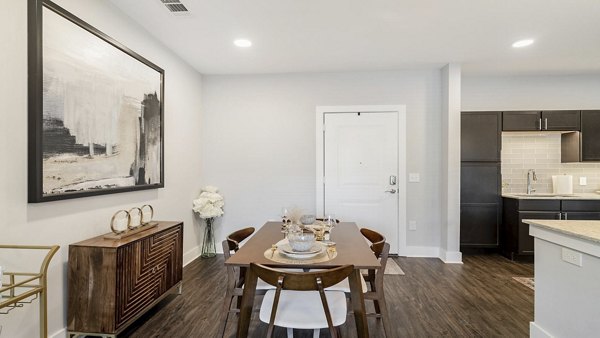 Elegant dining area with modern furnishings at Outlook Gwinnett Apartments