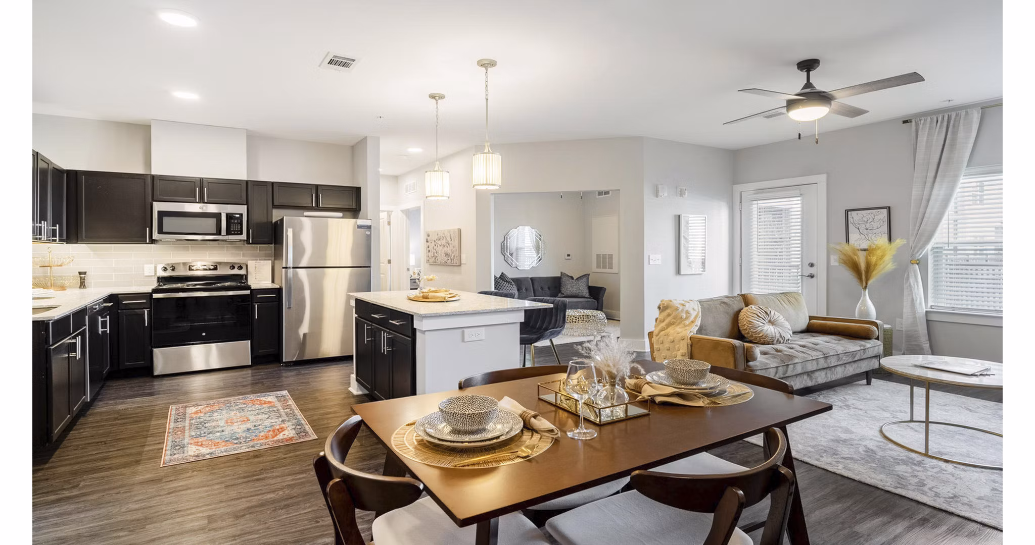 Dining area featuring modern furnishings and ample natural light in Outlook Gwinnett Apartments