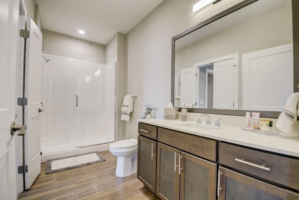 Luxurious bathroom with modern fixtures at Outlook Hamilton Apartments