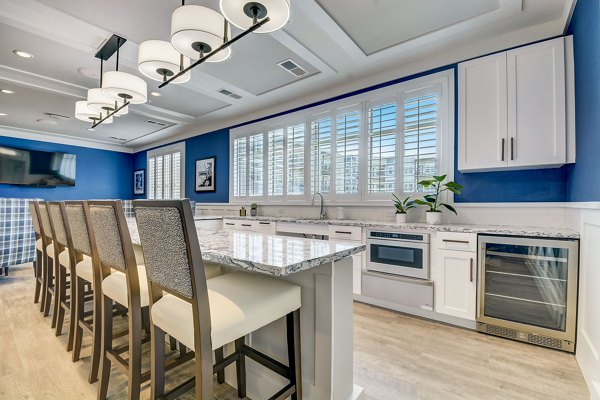 Elegant clubhouse with cozy seating and modern decor at Outlook Hamilton Apartments